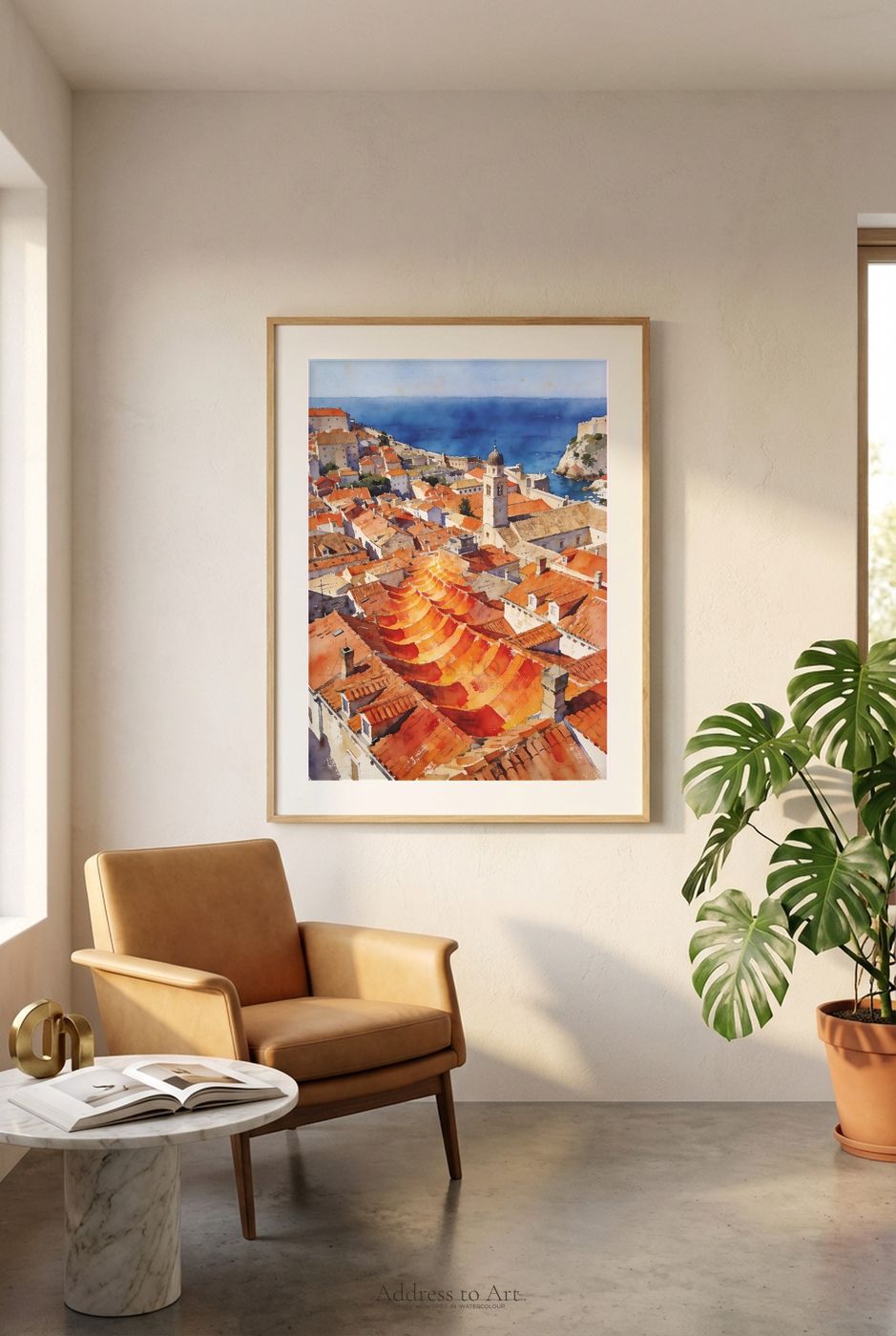 Dubrovnik watercolor print in an editorial room setting — framed on a warm-toned wall