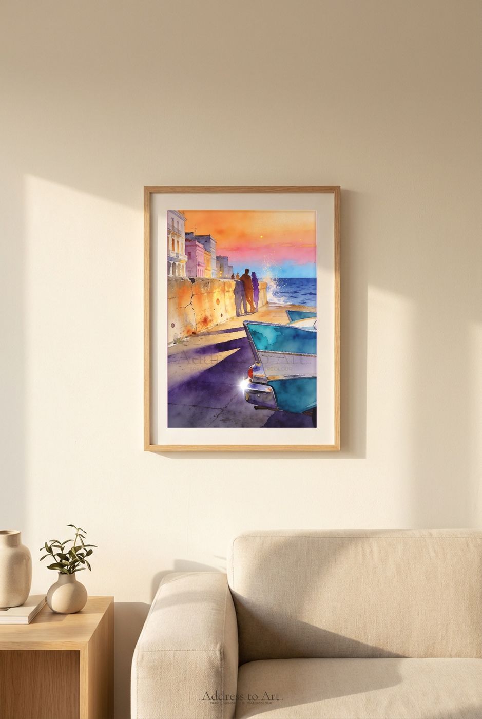 Havana watercolor in a warm living room — Malecón sunset, vintage car, on cream wall above a linen sofa
